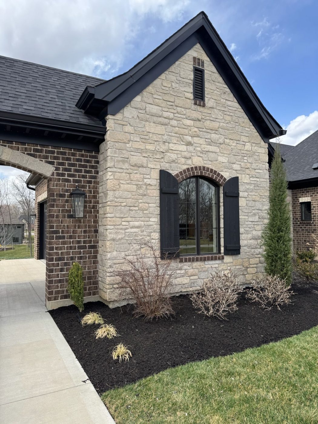Metro West Lawn & Landscape project โ Manicured front lawn